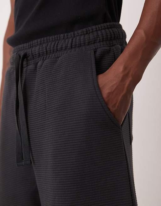 ASOS DESIGN Oversized Longer Length Textured Shorts In Navy