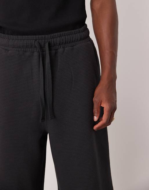 ASOS DESIGN Oversized Longer Length Textured Shorts In Navy