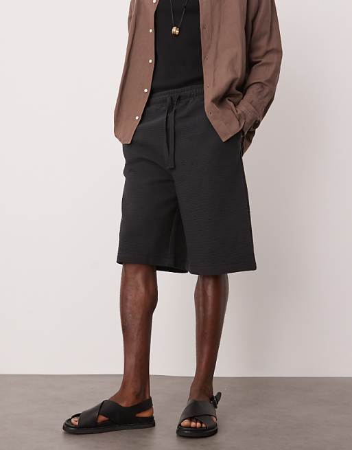 ASOS DESIGN oversized longer length textured shorts in navy