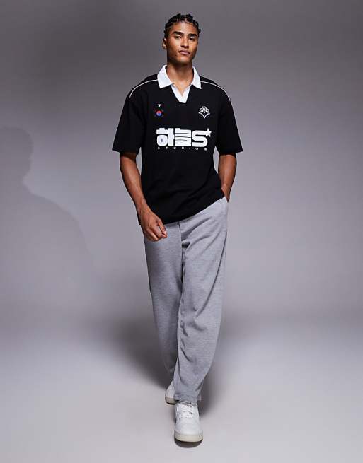 ASOS DESIGN Oversized Polo With Piping Detail And Sports Graphic In Black