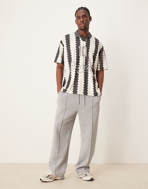 ASOS DESIGN Oversized Polo With Sports Graphic And All Over Print
