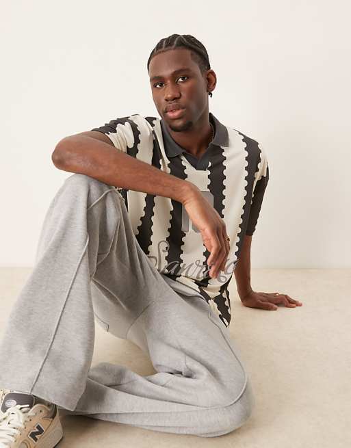 ASOS DESIGN Oversized Polo With Sports Graphic And All Over Print