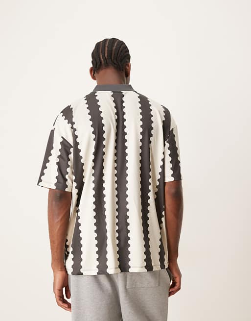 ASOS DESIGN Oversized Polo With Sports Graphic And All Over Print
