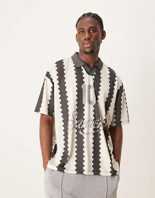ASOS DESIGN oversized polo with sports graphic and all over print