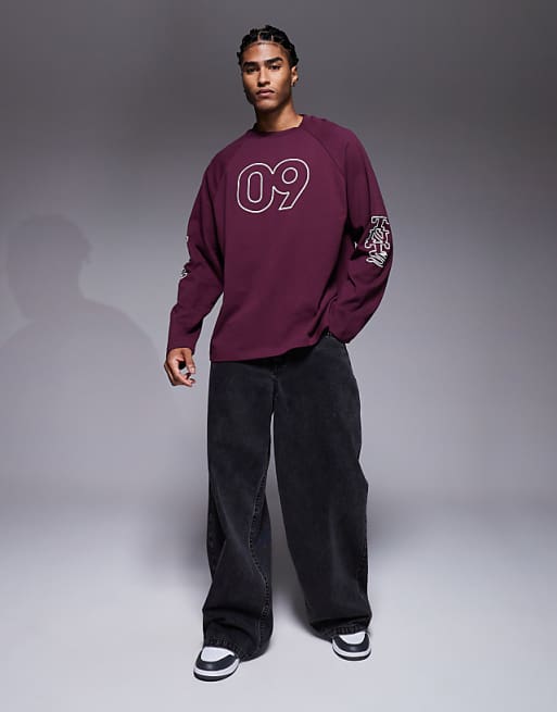 ASOS DESIGN Oversized Raglan Long Sleeve T-shirt With Flocked Sports Graphic In Burgundy