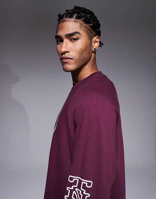 ASOS DESIGN Oversized Raglan Long Sleeve T-shirt With Flocked Sports Graphic In Burgundy