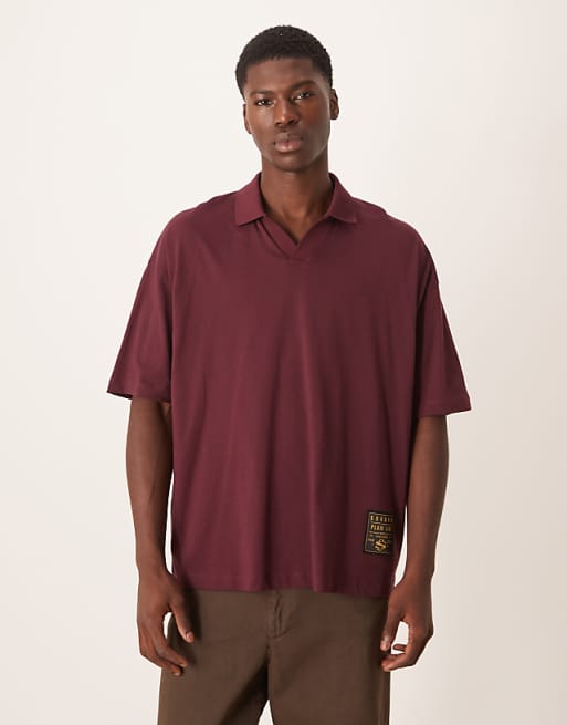 ASOS DESIGN oversized revere polo with woven tab in brown
