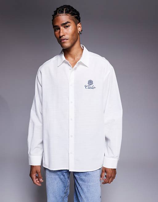 ASOS DESIGN oversized shirt with chest embroidery in white