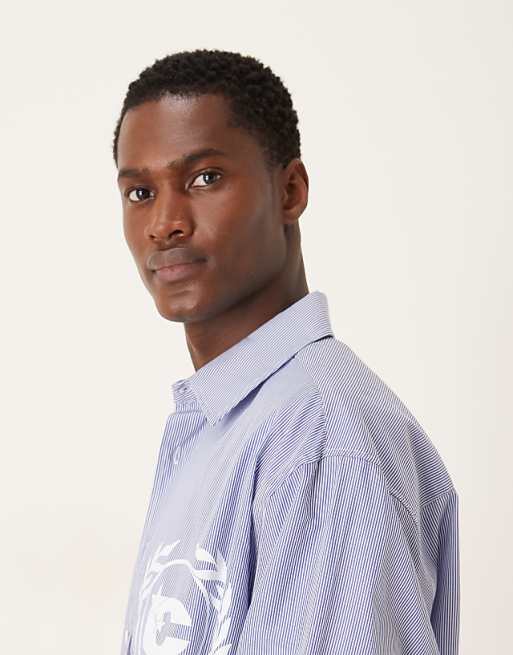 ASOS DESIGN Oversized Shirt With Chest Print In Blue And White Stripe