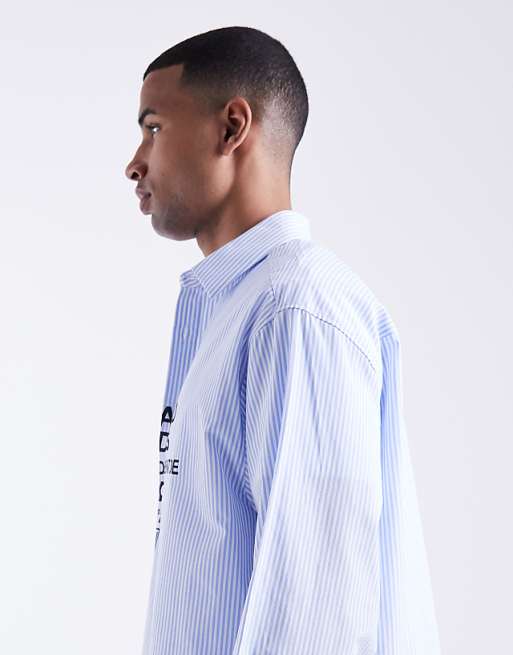 ASOS DESIGN Oversized Stripe Shirt With Chest Print In Blue