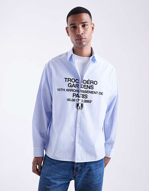 ASOS DESIGN oversized stripe shirt with chest print in blue
