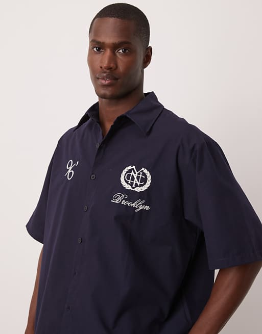 ASOS DESIGN oversized stripe shirt with embroidery in navy