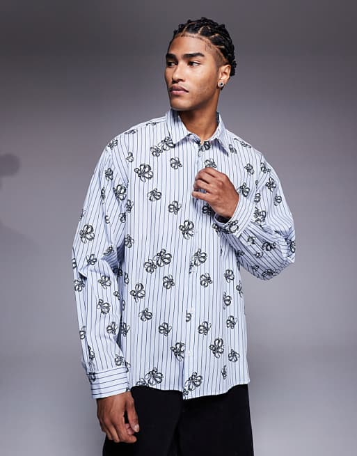 ASOS DESIGN oversized stripe shirt with floral print in blue