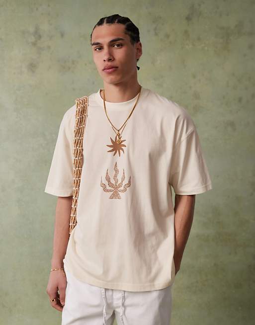 ASOS DESIGN oversized t-shirt with celestial graphic in cream