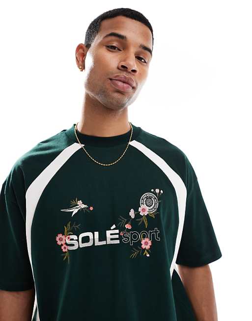 ASOS DESIGN oversized t-shirt with floral sport graphic and contrast panels in dark green