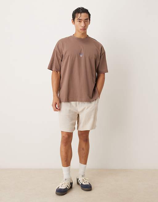 ASOS DESIGN Oversized T-shirt With Script Text In Brown