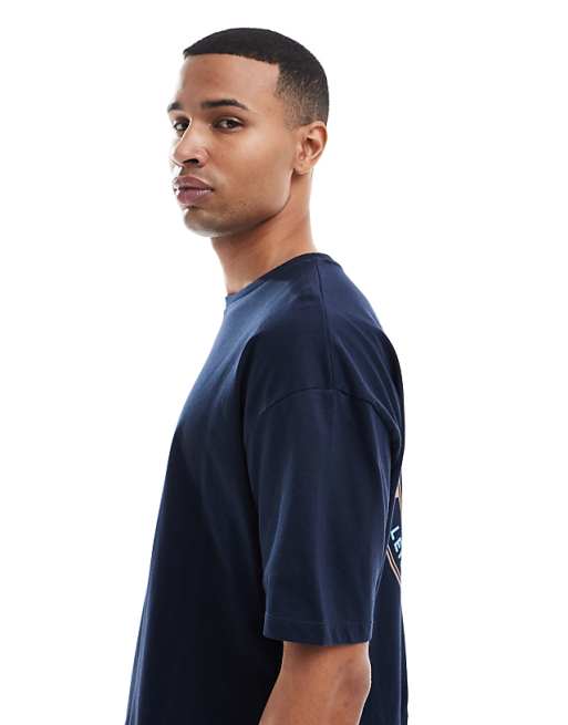 ASOS DESIGN Oversized T-shirt With Sport Front Graphic In Light Brown