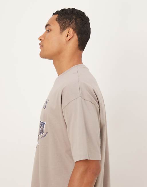 ASOS DESIGN Oversized T-shirt With Sports Graphic In Light Brown