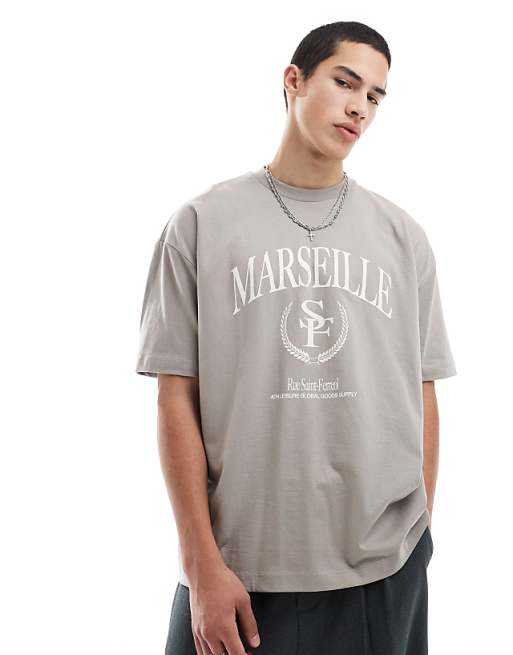 ASOS DESIGN oversized t-shirt with varsity graphics in brown
