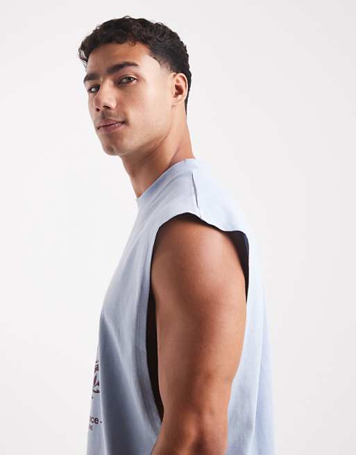ASOS DESIGN Oversized Tank With Dropped Armhole And Street Graphic In Light Blue