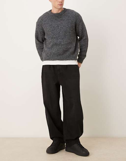 ASOS DESIGN oversized tapered jeans in black with pleats