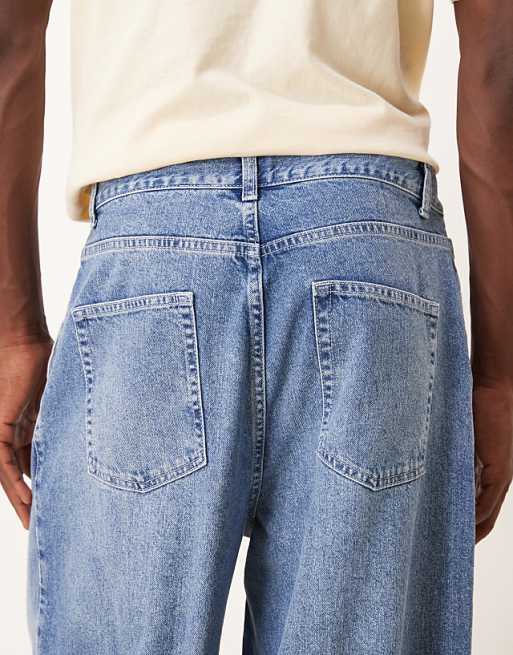 ASOS DESIGN Oversized Tapered Jeans In Light Wash Blue With Pleats