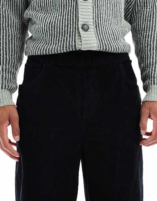 ASOS DESIGN Oversized Tapered Pull On Trousers In Black Corduroy