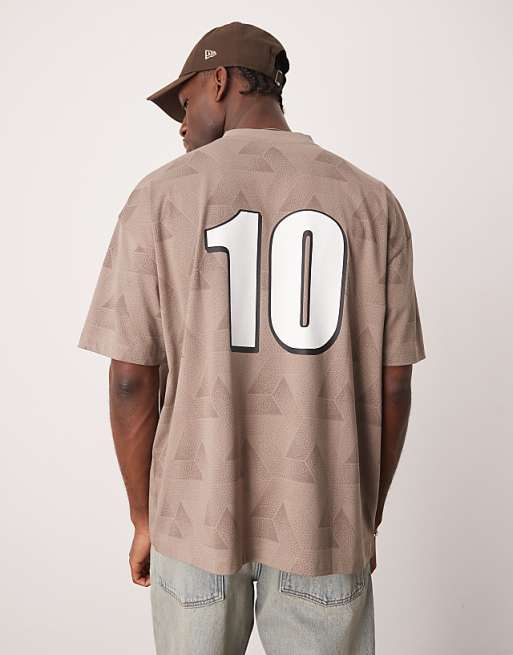 ASOS DESIGN oversized v-neck t-shirt with sports graphic in stone