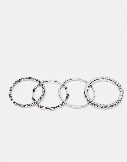 ASOS DESIGN Pack Of 12 Rings With Twist Details And Engraved Designs In Silver Tone