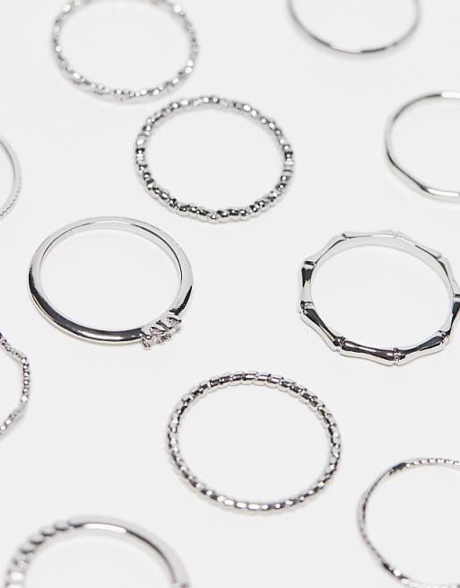 ASOS DESIGN Pack Of 12 Rings With Twist Details And Engraved Designs In Silver Tone