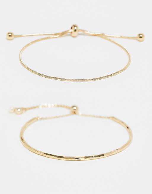 ASOS DESIGN pack of 2 bracelets with simple toggle detail in gold tone