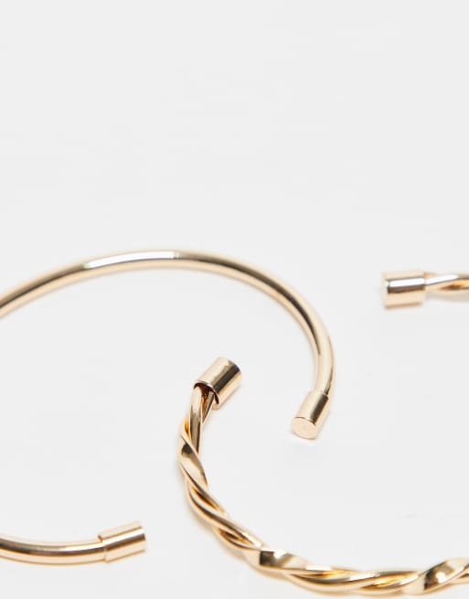 ASOS DESIGN Pack Of 2 Cuff Bracelets With Plain And Twist Detail In Gold Tone