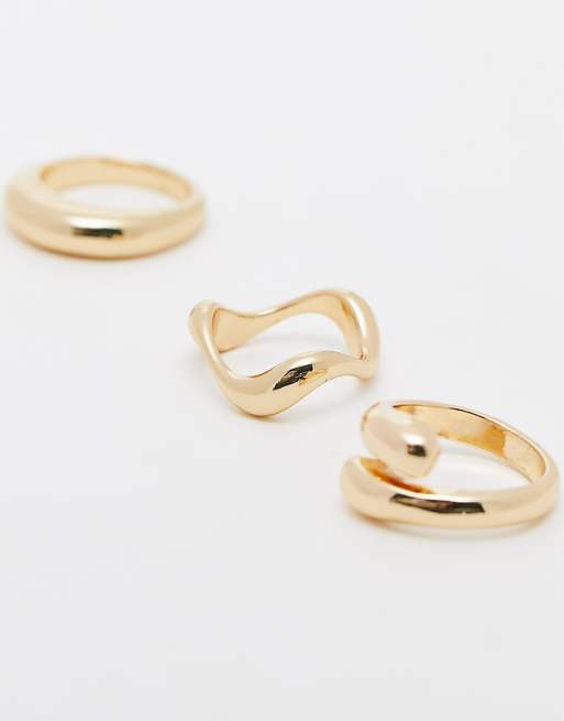 ASOS DESIGN Pack Of 3 Rings With Mixed Minimal Designs In Gold Tone