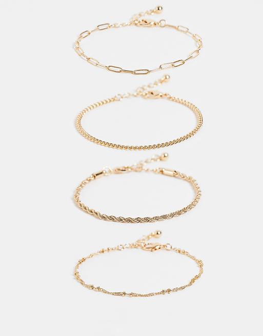 ASOS DESIGN pack of 4 fine chain bracelets in gold tone