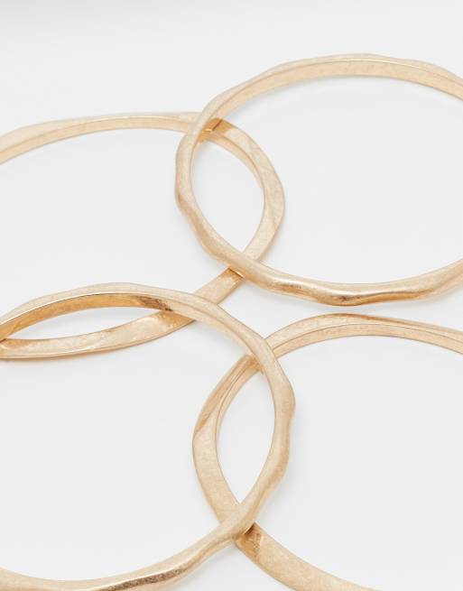 ASOS DESIGN Pack Of Bangles With Molten Design In Brushed Gold