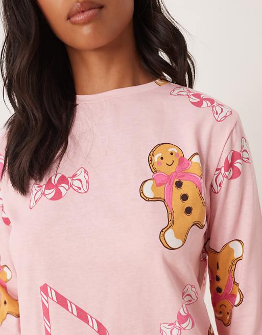 ASOS DESIGN Petite Gingerbread & Candy Cane Long Sleeve Top & Trouser Pyjama Set In Pink Marl