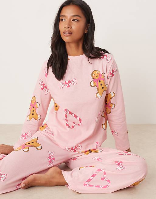 ASOS DESIGN Petite gingerbread & candy cane long sleeve top & trouser pyjama set in pink marl