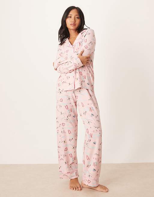 ASOS DESIGN Petite super soft long sleeve shirt & trouser pyjama set with contrast piping in ski print