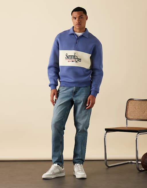 ASOS DESIGN Polo Sweatshirt With Contrast Panel And Print In Blue