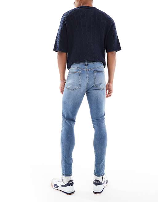ASOS DESIGN Power Stretch Jeans In Mid Wash Blue