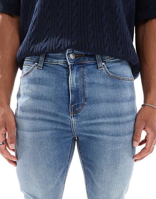 ASOS DESIGN Power Stretch Jeans In Mid Wash Blue
