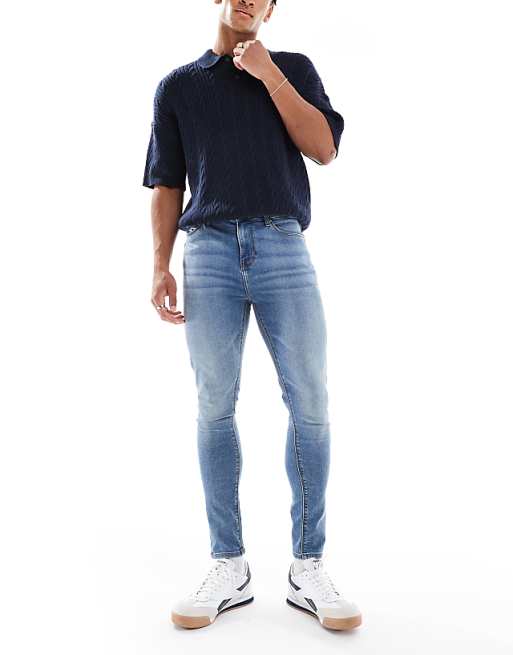 ASOS DESIGN power stretch jeans in mid wash blue