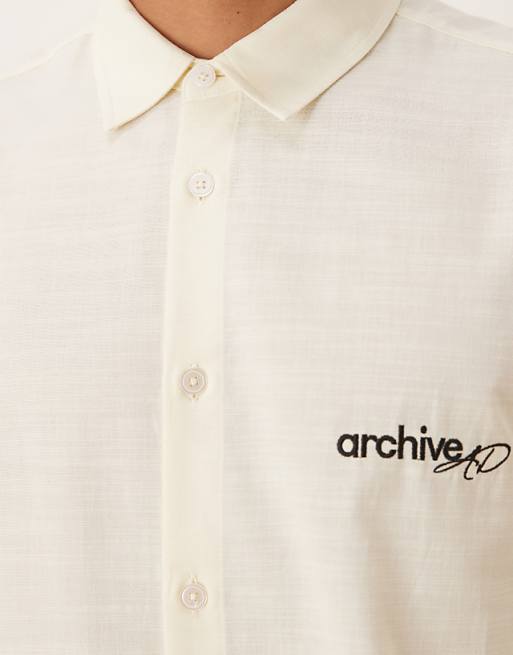 ASOS DESIGN Regular Fit Shirt With Chest Embroidery In Beige