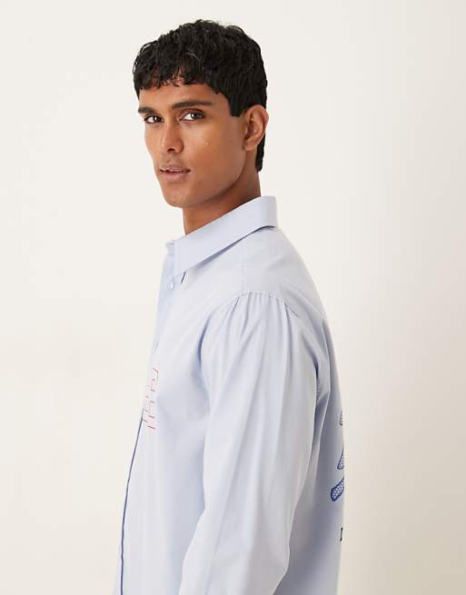 ASOS DESIGN Relaxed Fit Long Sleeved Shirt With Print Detail In Blue Poplin