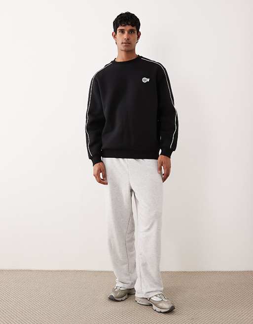 ASOS DESIGN Relaxed Fit Sweatshirt With Chest Print In Black