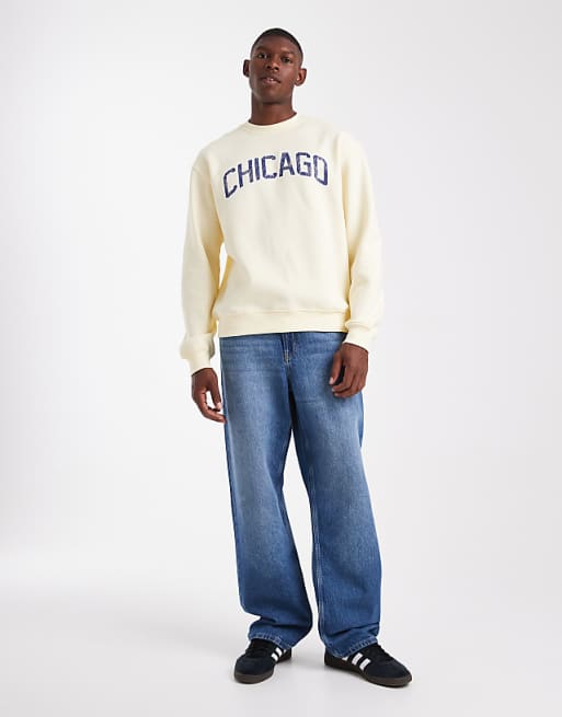 ASOS DESIGN Relaxed Fit Sweatshirt With Distressed Text Embroidery In Pale Yellow