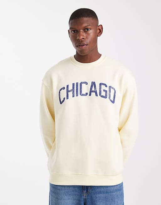 ASOS DESIGN relaxed fit sweatshirt with distressed text embroidery in pale yellow