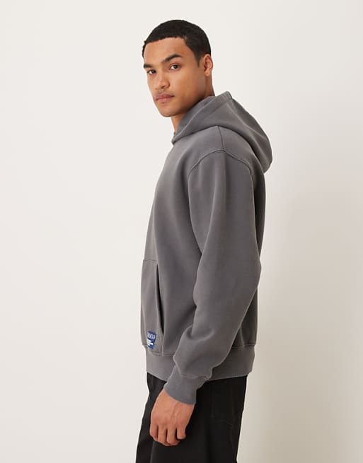 ASOS DESIGN Relaxed Hoodie With Woven Label In Washed Charcoal