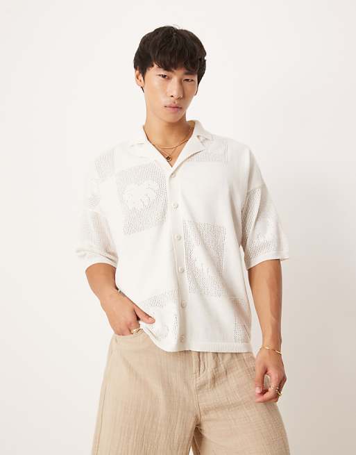 ASOS DESIGN relaxed knitted textured floral button through polo in cream