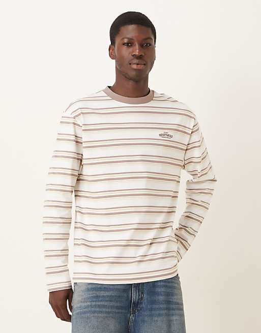 ASOS DESIGN relaxed long sleeve t-shirt with text graphic in beige and white stripe